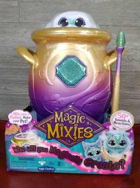 14652 Moose Toys Magic Mixie Magical Misting Cauldron With Interactive 8 Inch Blue Plush Mixies In Hand