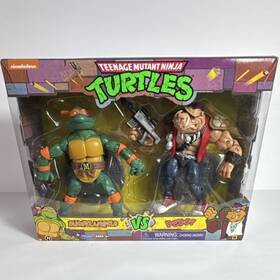 Playmates Toys Atm1193 Teenage Mutant Ninja Turtles Michelangelo Vs Bebop Boxed Playset