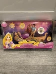 2010 Disney Rapunzel Boat Ride New Retired Tangled Dolls. Price: $64.99.