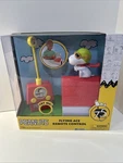 New Just Play Peanuts 75 Years Snoopy Dog House Flying Ace Remote Control. Price: $17.00.