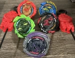 Hasbro Beyblade Burst Quaddrive Lot 5 Spinning Tops W/ Launchers (2020) Used. Price: $30.00.