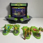 Akedo Teenage Mutant Ninja Turtles Battle Arena Playset W/ Mini Warriors Figures Used. Price: $50.00.
