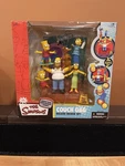 2006 Mcfarlane Toys The Simpsons Couch Gag Deluxe Boxed Action Play Set New. Price: $78.00.