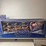 Vintage Memory Lane Rudolph Sanat Sleigh & Reindeer Team Playset New Box. Price: $375.00.