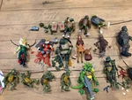 Neca Teenage Mutant Ninja Turtles 1990 Action Figures Used. Price: $135.00.