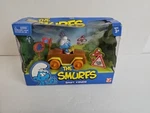 Vehicle The Smurfs Jakks Pacific Poseable Figure Pull Back Motor Used. Price: $14.99.