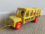 Vintage Fisher Price Little People Wood Pull-toy School Bus With Driver & 3 Kids Used. Price: $16.99.