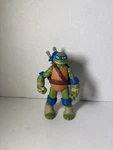 Playmate Teenage Mutant Ninja Turtles Leonardo Action Figure Used. Price: $12.00.