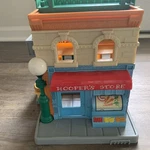 2010 Hasbro Sesame Street 123 Mr. Hooper's Store Toy Grocery With 22 Figures Used. Price: $100.00.
