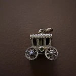 Vintage Monet Princess Carriage Charm Gold Tone 1960S Crystals Wheels Spin Pre-owned. Price: $20.00.