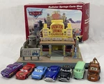 Disney Cars Radiator Springs Curio Shop Playset Box Rare + Extras Used. Price: $250.00.