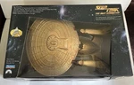 Star Trek Sttng 7TH Anniversary Gold Uss Enterprise Playmates 1993 New. Price: $99.99.
