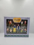 Disneyland Snow White The Seven Dwarfs Collectible Poseable Figures New. Price: $29.99.