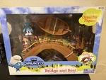 The Smurfs Village Bridge & Boat Playset W/grouchy New In Box 2011. Price: $49.95.