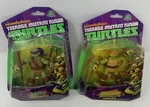 Tmnt Nickelodeon Teenage Mutant Ninja Turtles Donatello Michelangelo Figure 2 P New. Price: $29.26.