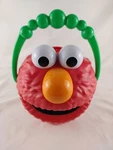 Sesame Street Giggle & Bubble Elmo Talks Counts Sings Says Over 15 Phrases Used. Price: $24.99.