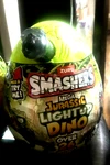 Zuru Smashers Mega Jurassic Light Up Dino T-rex Black Or Dark Bone Package New. Price: $12.00.
