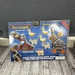 Ye Olde Monty Python Cow Catapult Deluxe Set Sealed Vintage 2004 Toy Vault New. Price: $24.99.
