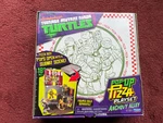 Teenage Mutant Ninja Turtles Anchovy Alley Pop Up Pizza Box Playset. New. Price: $64.75.