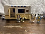 Moose Toys Bluey Caravan Adventures Transforming Playset With 4 Action Figures Used. Price: $25.00.