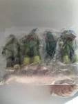 Playmate Teenage Mutant Ninja Turtles Set Of Action Figures W/weapons. 4.7 New. Price: $17.99.