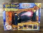 New 2001 Harry Potter And The Sorcerers Stone Powercaster Spell-casting Playset. Price: $59.99.