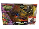 Teenage Mutant Ninja Turtles Chopper Cycle With Rocksteady Action Figure Set New. Price: $19.99.