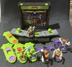 Akedo Teenage Mutant Ninja Turtles Battle Arena Playset & Warriors Figures Used. Price: $108.56.