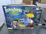 Vintage 1998 Toy Island Toonsylvania Deluxe Laboratory Playset New Open Box. Price: $24.99.