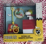 New Just Play Peanuts 75 Years Snoopy Dog House Flying Ace Remote Control Nib. Price: $30.00.