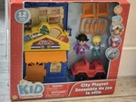 New Kid Connection City Playset. Light & Sound. 12 Pieces. Ages 3+. Price: $15.00.