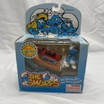The Smurfs 1996 Irwin Peyo Boating & Die Cast Speed Poseable Figure New. Price: $15.00.