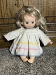 Vintage 1970S Uneeda Baby Doll Blonde Hair Blue Eyes Dress Used. Price: $9.99.