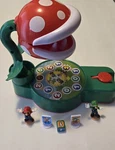 Epoch Games Super Mario Piranha Plant Escape! - Tabletop Action Open Box Used. Price: $12.00.