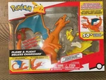 Jazwares PKW4262 Pokemon 6" Interactive Charizard Deluxe Figure W/2" Pikachu New. Price: $25.99.