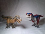Schleich Dinosaurs - Red And Blue Rex Action Figures With Movable Jaws 11" Used. Price: $34.99.