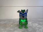 Paw Patrol Mighty Pups Rocky Charged Figure Light Used. Price: $28.99.