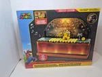 Nintendo Super Mario Bros Deluxe Bowser Battle Action Figure Playset New. Price: $39.98.