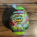 New Zuru Smashers Mini Jurassic Light Up Dino Grey Spinosaurus & Slime Egg. Price: $18.99.