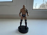 The Rock Wwe Wrestler Figurine 3 Inch Action Figure Stampers Series By Pmi Used. Price: $10.00.